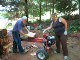 Photo of log splitter and crew.